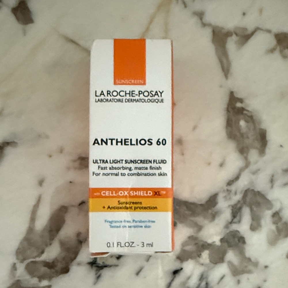 La Roche-Posay Anthelios 60 Ultra Light Sunscreen Fluid - Orange and White